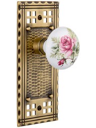 Pasadena Door Set with Rose Porcelain Knobs in Antique Brass.